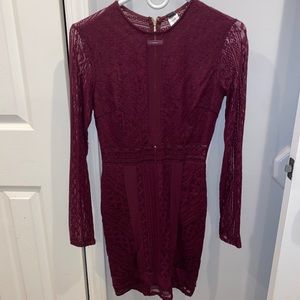 Lace burgundy dress size medium, still has tags and has never been worn.